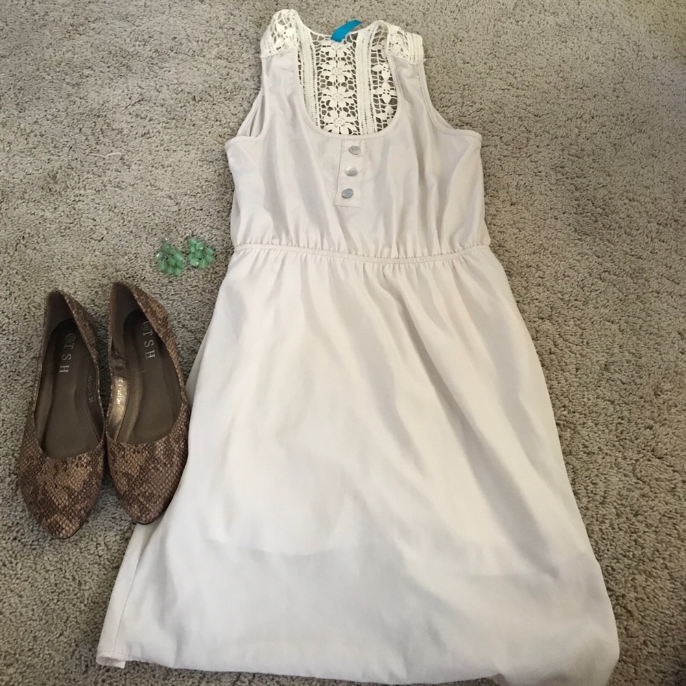 Cute beige dress with lace back detailing